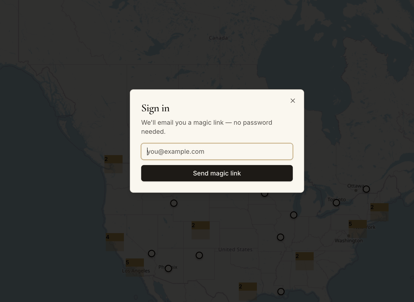 Sign in modal over the map, reading 'We'll email you a magic link — no password needed', with an email field and Send magic link button