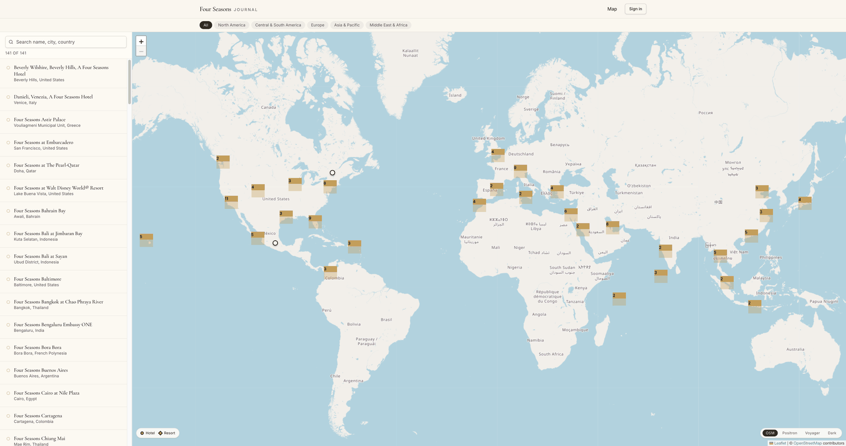 Four Seasons Journal world map showing 141 properties as circular markers across North America, Europe, Asia, and beyond